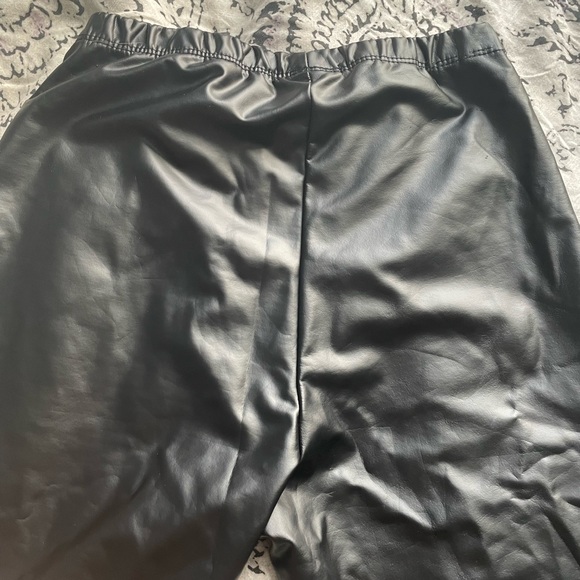 Fashion Nova leather biker shorts and blue shirt - Picture 3 of 6